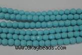 CTU1220 15.5 inches 4mm faceted round synthetic turquoise beads