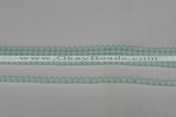 CTU2563 15.5 inches 4mm round synthetic turquoise beads