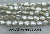 FWP352 15 inches 6mm - 7mm baroque white freshwater pearl strands
